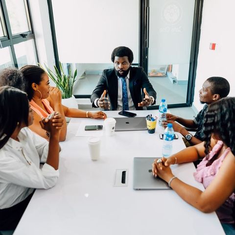 A team meeting in a Lagos office
